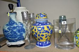 A GROUP OF LAMP BASES, GLASS LIGHT SHADES, CANDLE HOLDERS, etc, comprising two coloured leaded glass