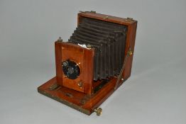 A MAHOGANY AND BRASS CASED 6X8 PLATE CAMERA with a C.P. Goerz, Berlin lens assembly and a Goerz