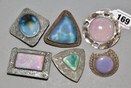 SIX RUSKIN STYLE ENAMELS MOUNTED AS BROOCHES, no makers marks, various glazes and shapes, diameter