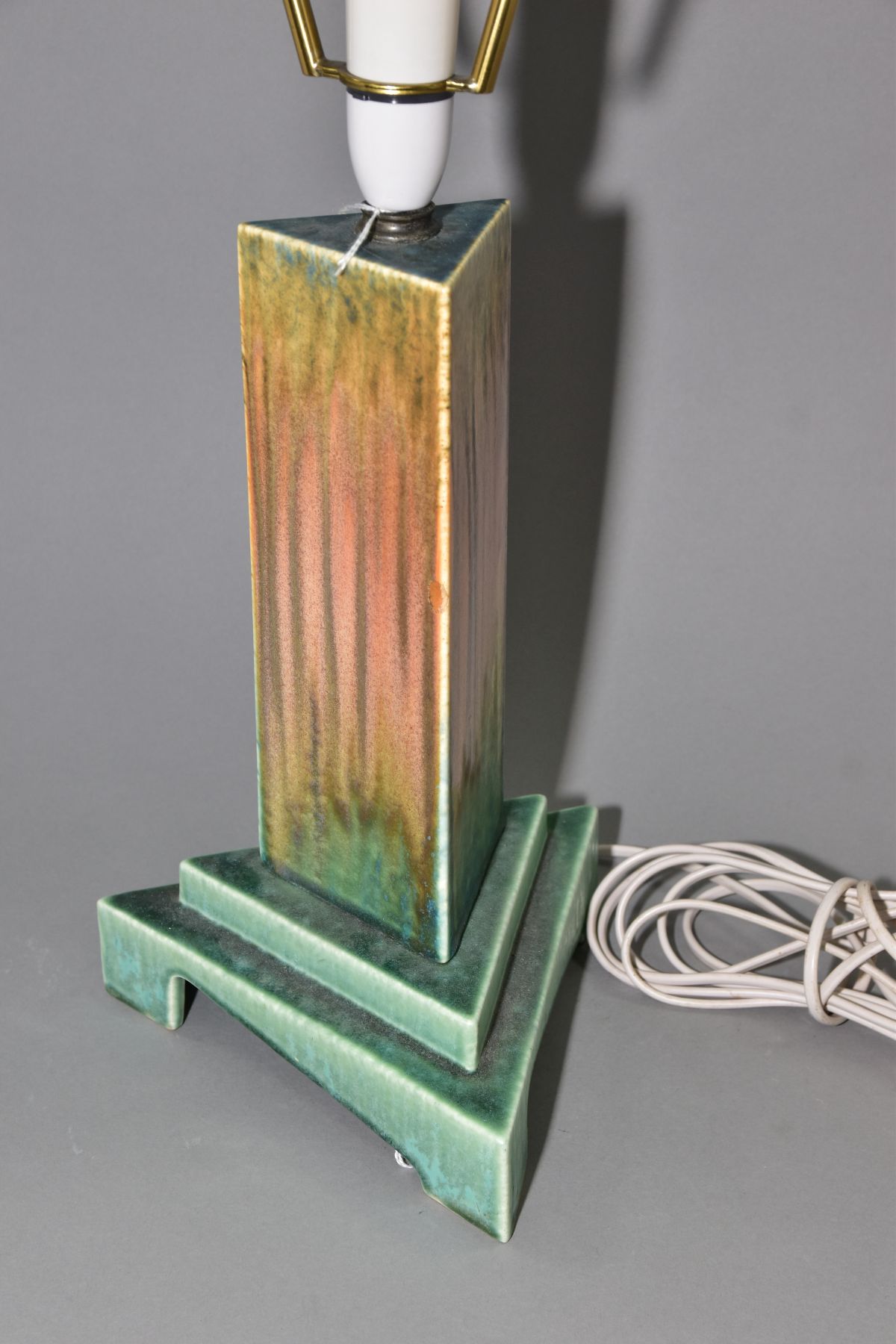 RUSKIN POTTERY, a triangular section moulded lamp base, matt green and orange gloss crystalline - Image 2 of 7