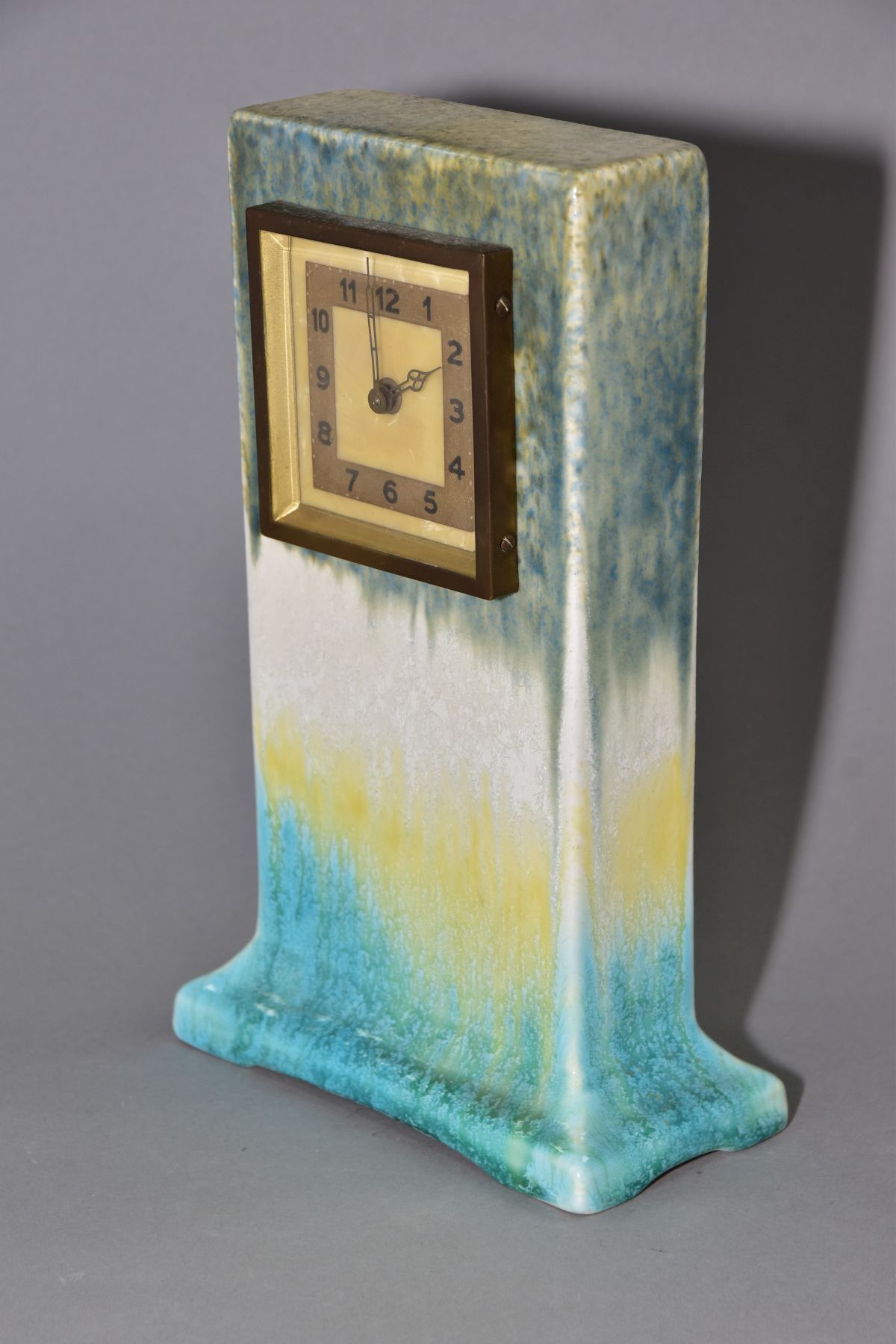 RUSKIN POTTERY, a rectangular clock case with flared base, matt green fading to white and yellow, - Image 2 of 5