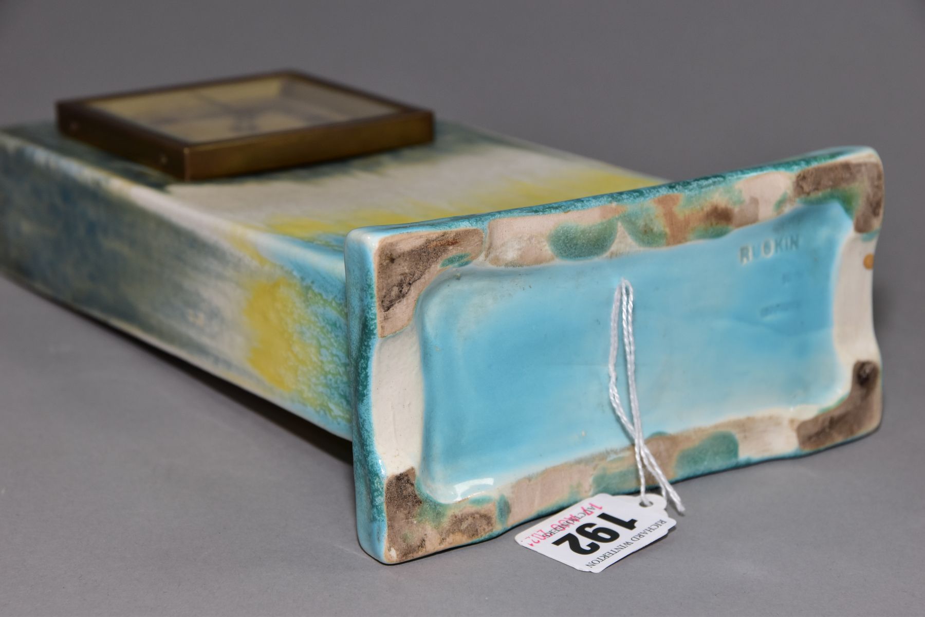 RUSKIN POTTERY, a rectangular clock case with flared base, matt green fading to white and yellow, - Image 5 of 5