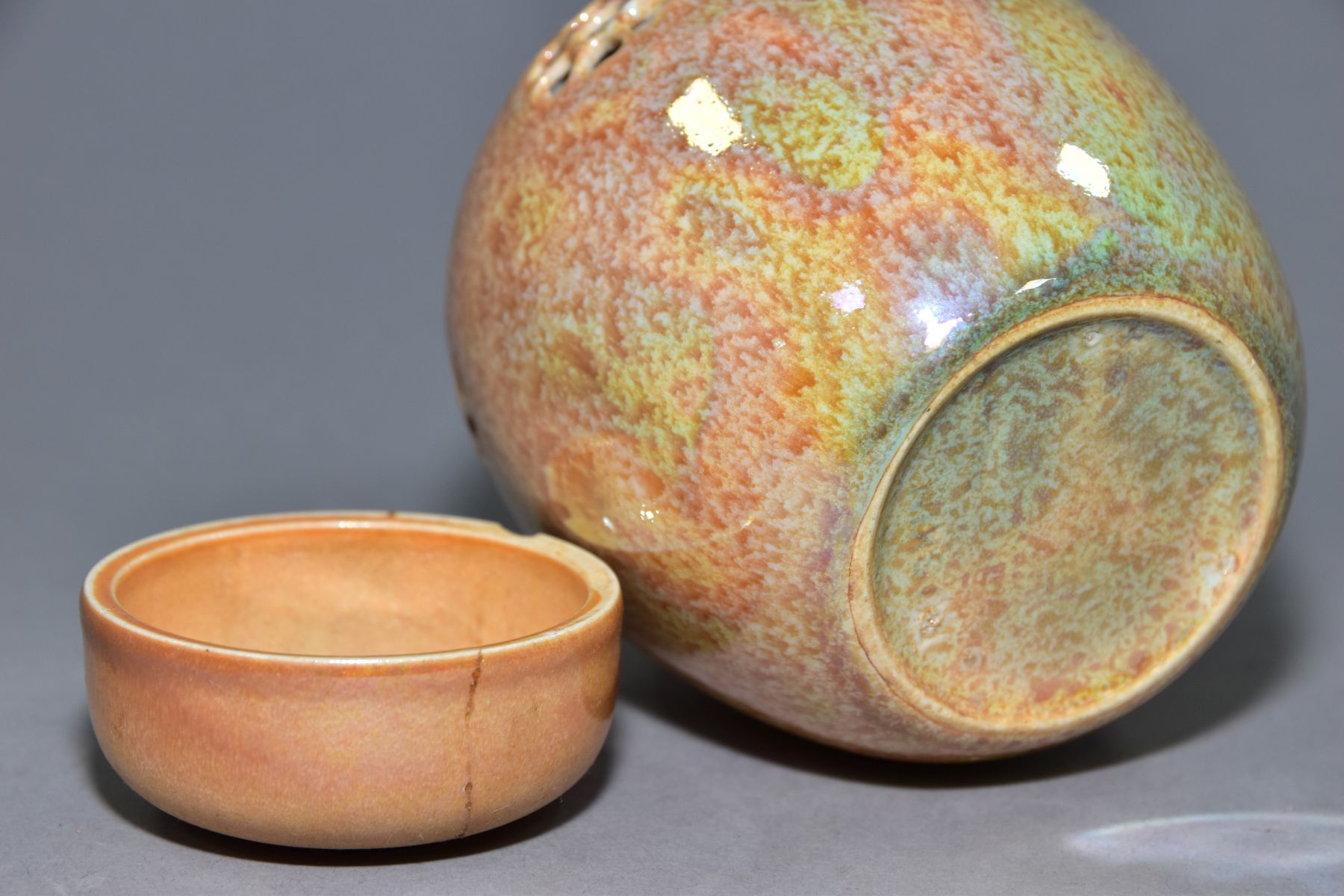 RUSKIN POTTERY, a peach lustre reticulated ginger/pot pourri jar with cover, the body pierced with - Image 6 of 6