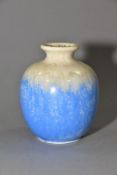 RUSKIN POTTERY, a globular vase with blue crystalline and cream glazes, impressed Ruskin England,