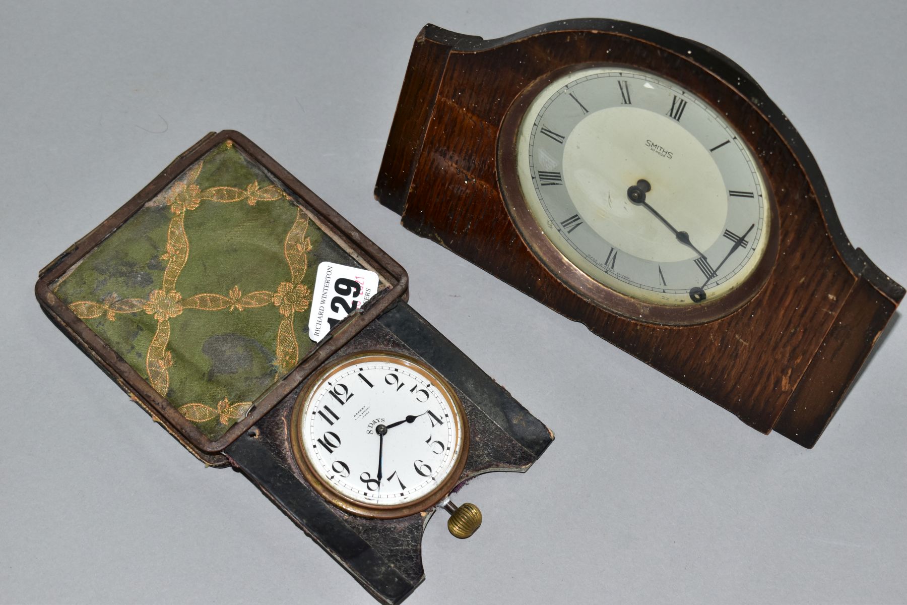 AN EARLY 20TH CENTURY ASPREY 8 DAY TRAVEL CLOCK, in a damaged leather folding case, incomplete, - Image 5 of 5