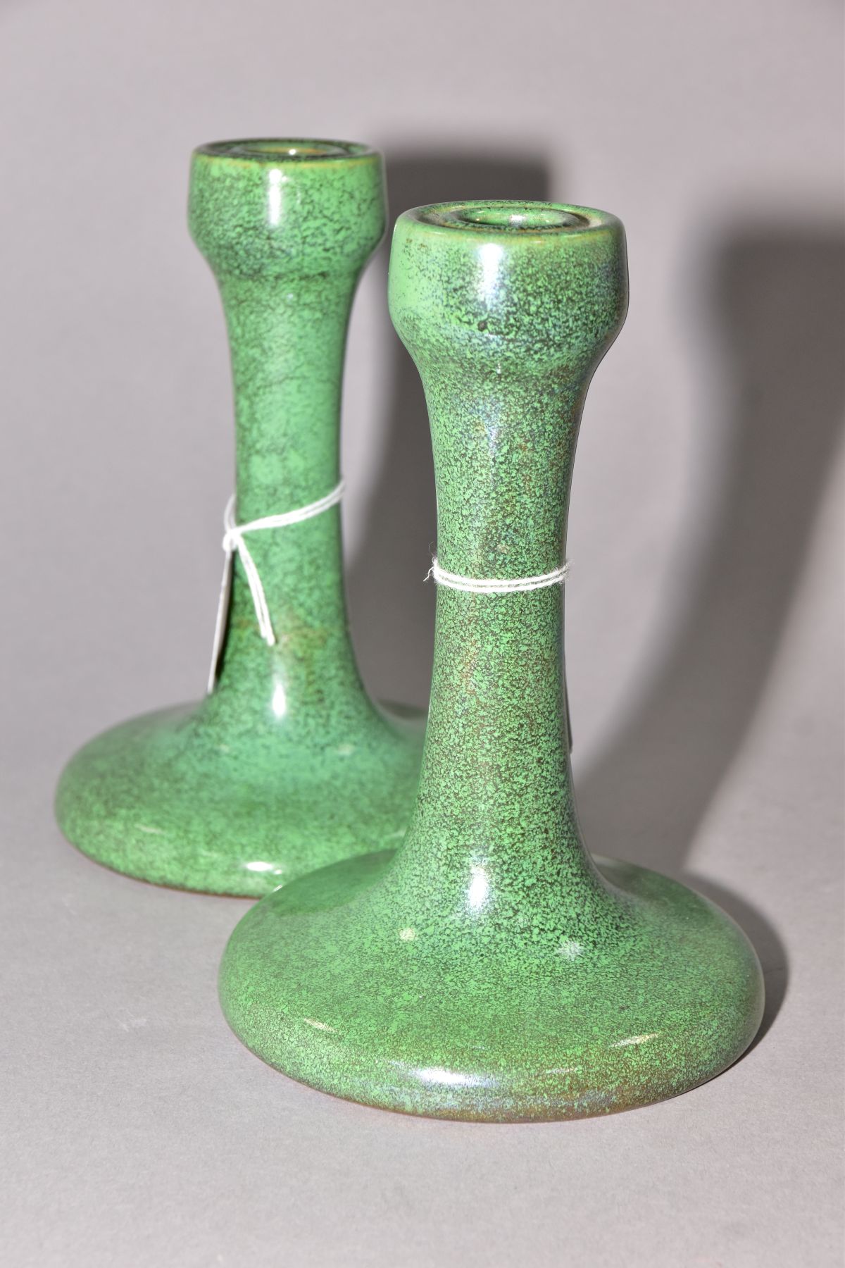 RUSKIN POTTERY, a pair of candlesticks covered in green tea dust glaze, inscribed Ruskin England - Image 3 of 5