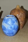 TWO UNMARKED CRYSTALLINE GLAZE VASES, comprising a blue example, approximate height 13cm and a