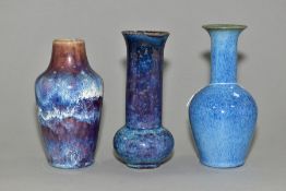 THREE COBRIDGE STONEWARE BLUE GLAZED HIGH FIRED VASES, comprising a bulbous shaped vase with