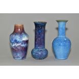 THREE COBRIDGE STONEWARE BLUE GLAZED HIGH FIRED VASES, comprising a bulbous shaped vase with