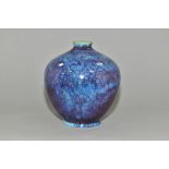 A COBRIDGE STONEWARE HIGH FIRED OVOID VASE, mottled and speckled green blue glaze over a purple/