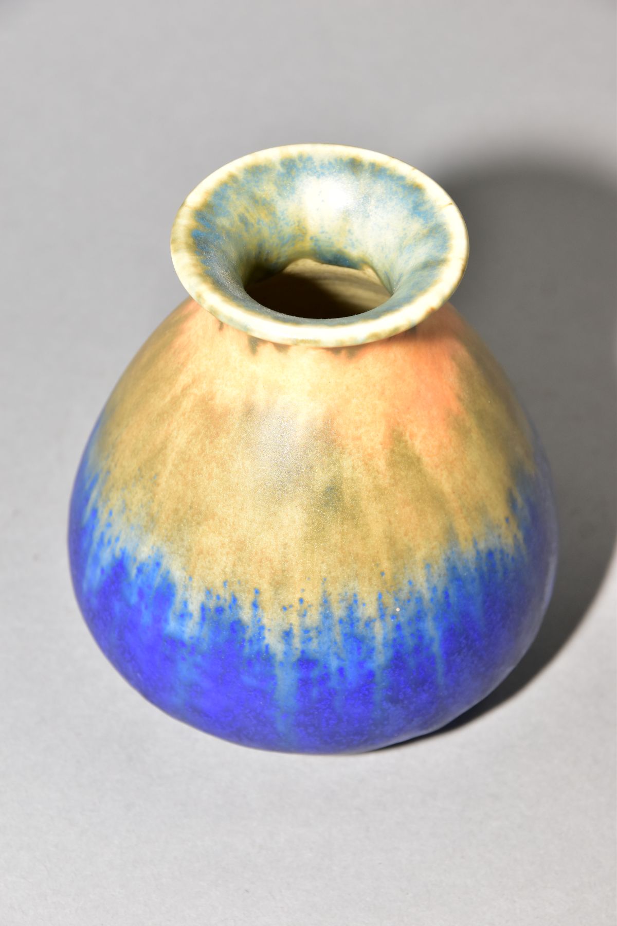 RUSKIN POTTERY, a conical vase with flared rim, bands of orange, green and blue glaze, approximate - Image 2 of 4