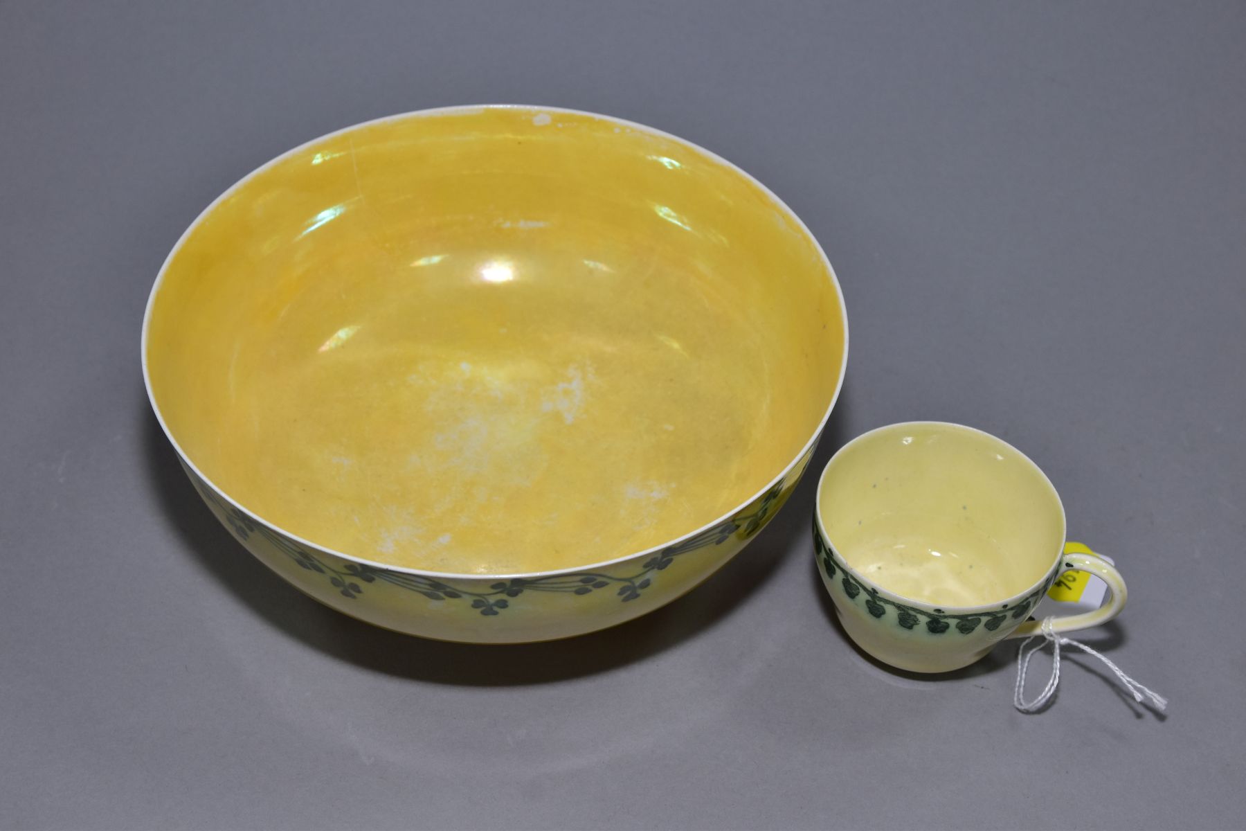 RUSKIN POTTERY, a footed eggshell bowl, covered in a yellow glaze with a band of clover to the outer - Image 2 of 5