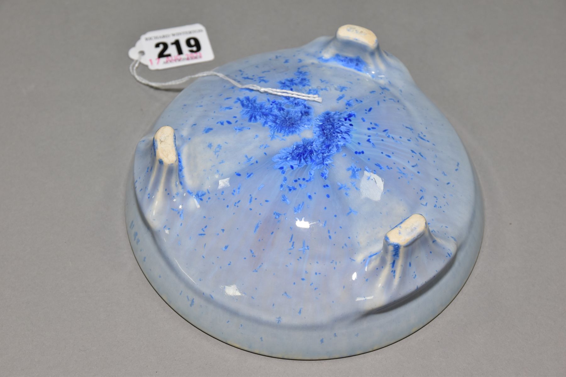 RUSKIN POTTERY, a shallow bowl raised on three feet, blue crystalline and streaked glaze, - Image 4 of 5
