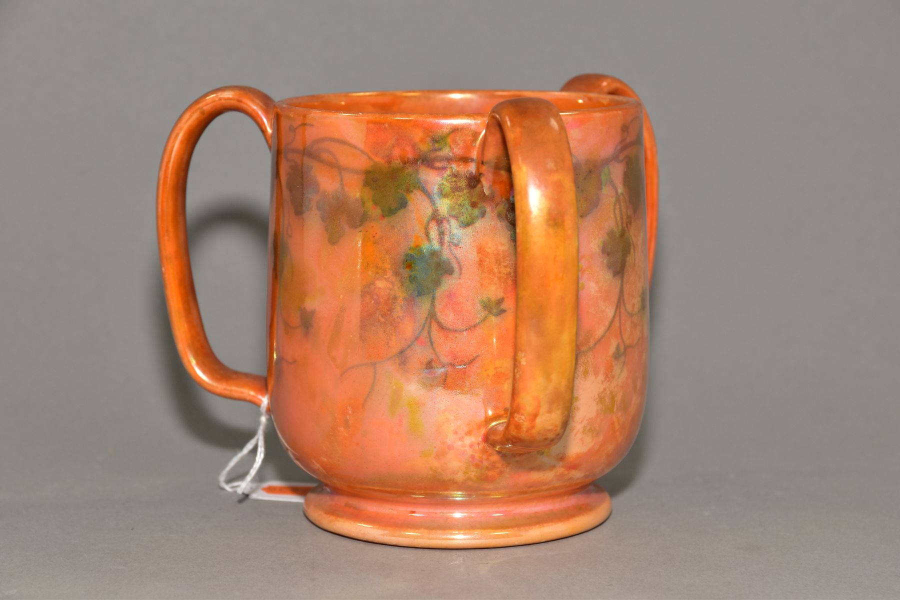 RUSKIN POTTERY, a three handled tyg decorated in orange lustre with a band of underglazed foliate - Image 2 of 5