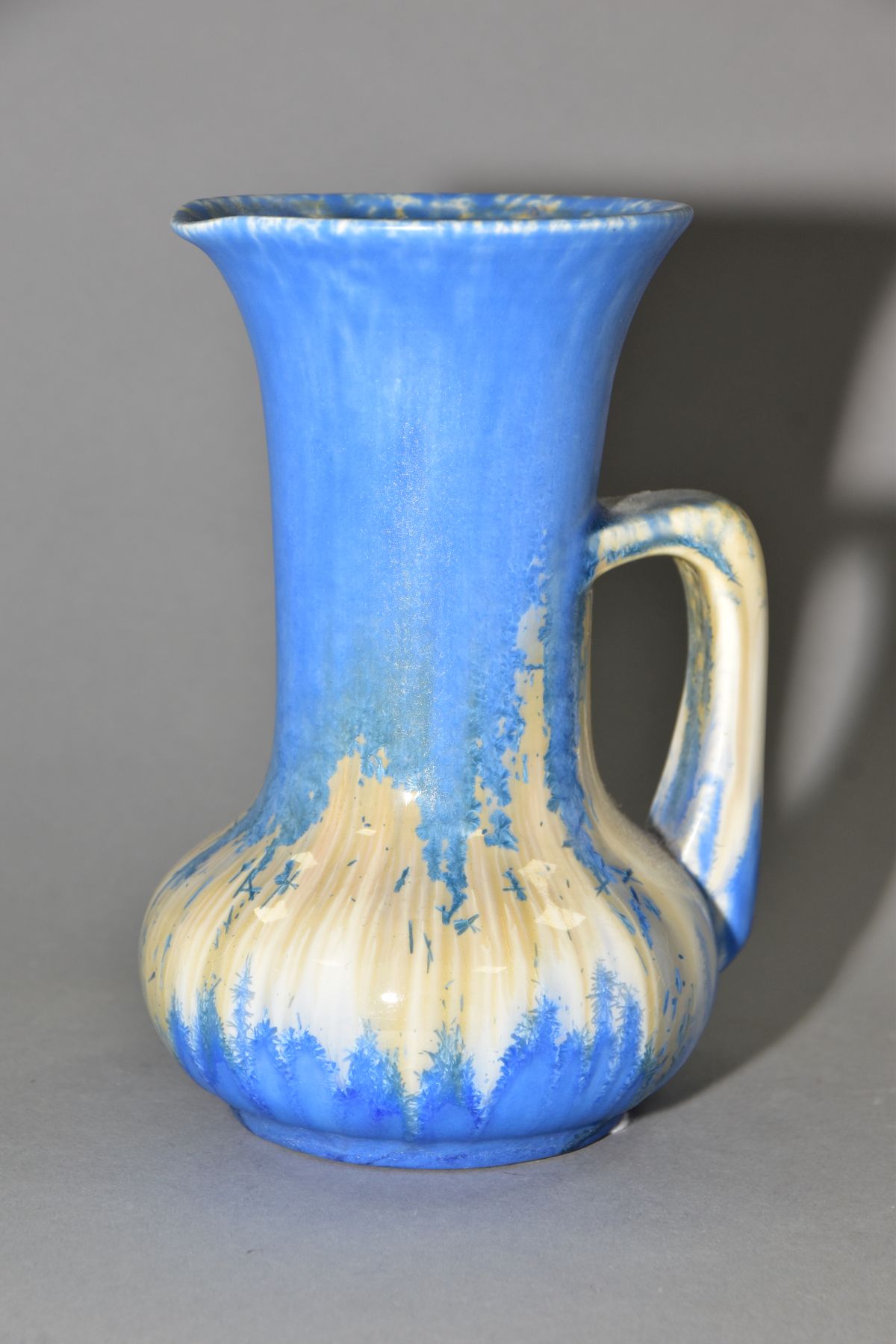 RUSKIN POTTERY, a water jug of onion form, covered in blue crystalline white and cream glazes, - Image 3 of 5