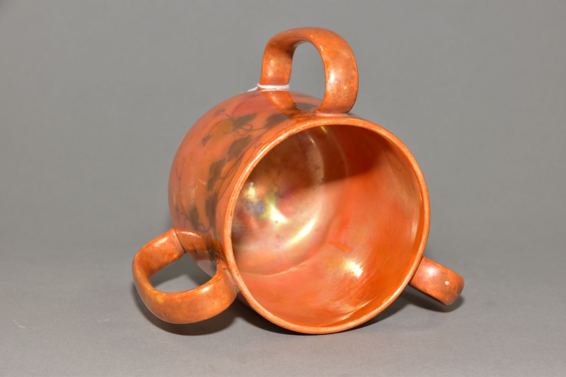RUSKIN POTTERY, a three handled tyg decorated in orange lustre with a band of underglazed foliate - Image 4 of 5