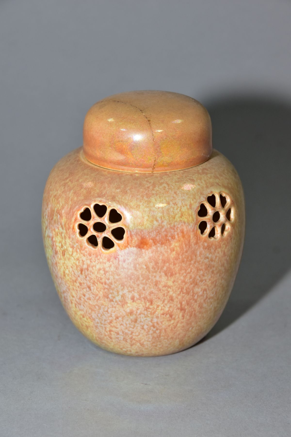 RUSKIN POTTERY, a peach lustre reticulated ginger/pot pourri jar with cover, the body pierced with - Image 3 of 6