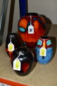 FOUR MODERN POOLE POTTERY VASES, two of baluster form and two of inverted tapering flattened form,