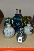 SEVEN PIECES OF MDINA GLASS, comprising a triangular scent bottle, two spherical scent bottles,