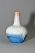 A MALLET SHAPED POTTERY VASE, crackle glaze fading from buff to blue, possibly by the Ashby Guild,