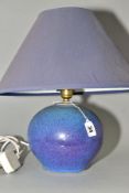 A DARTINGTON POTTERY TABLE LAMP, of globular form, with a high fired mottled blue glaze, impressed