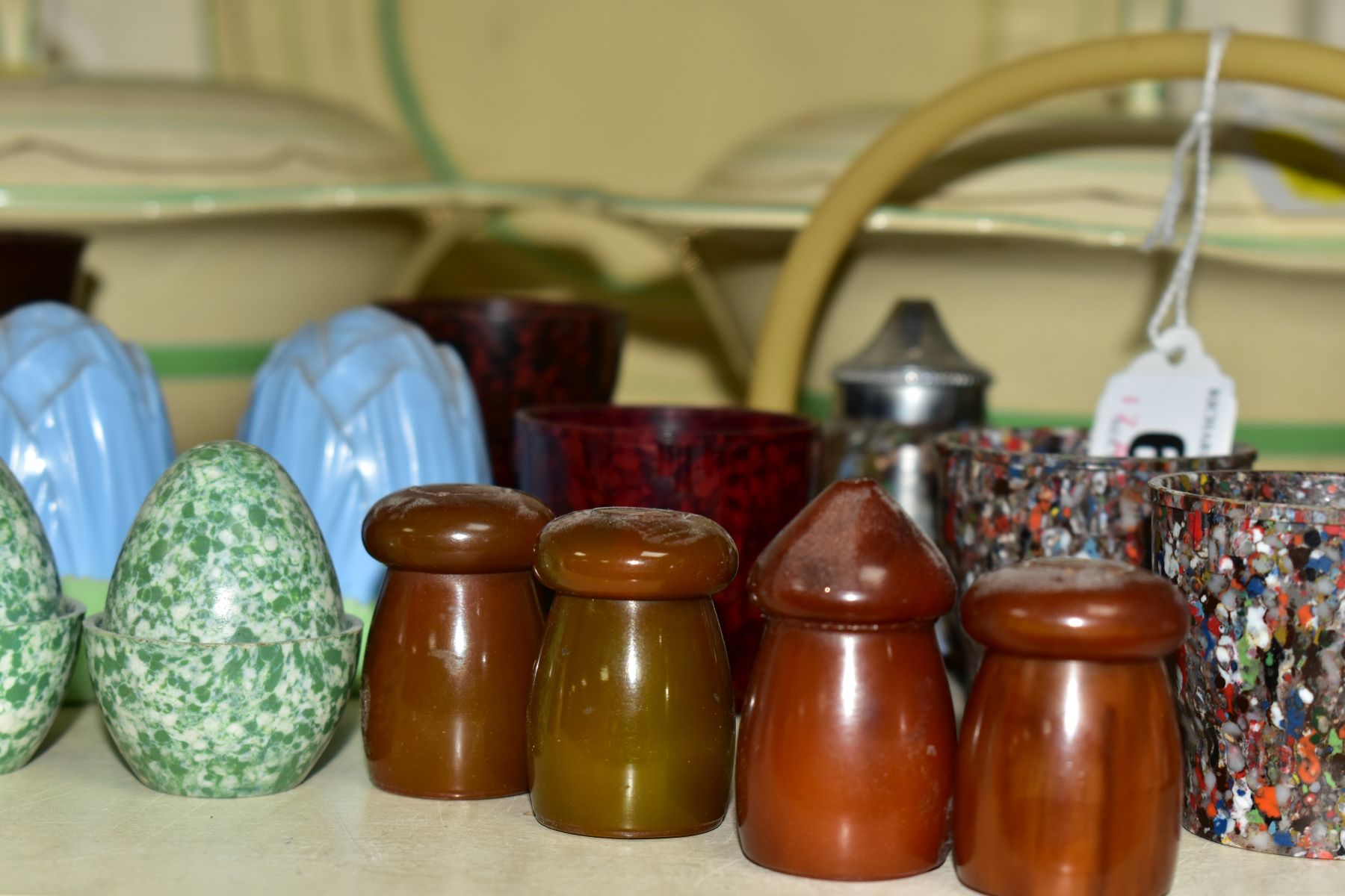 A SMALL COLLECTION OF BAKELITE AND PLASTIC CRUETS, EGG CUPS, etc, a pair of Royal Staffordshire - Image 5 of 5