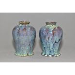 A PAIR OF COBRIDGE STONEWARE HIGH FIRED BALUSTER VASES WITH FLARED FOOTRIMS, mottled and speckled