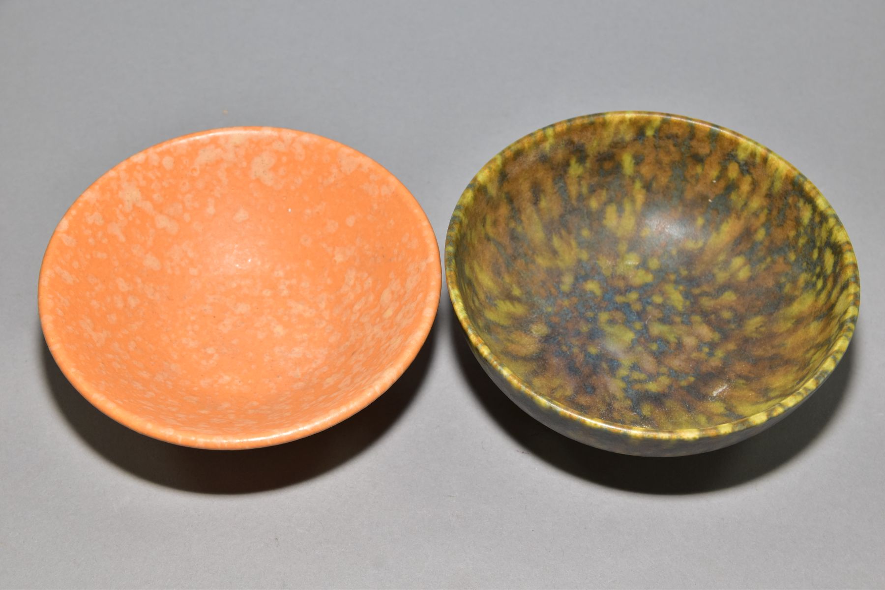 RUSKIN POTTERY, two footed bowls of mottled glazes, the first is orange and is impressed Ruskin - Image 2 of 5