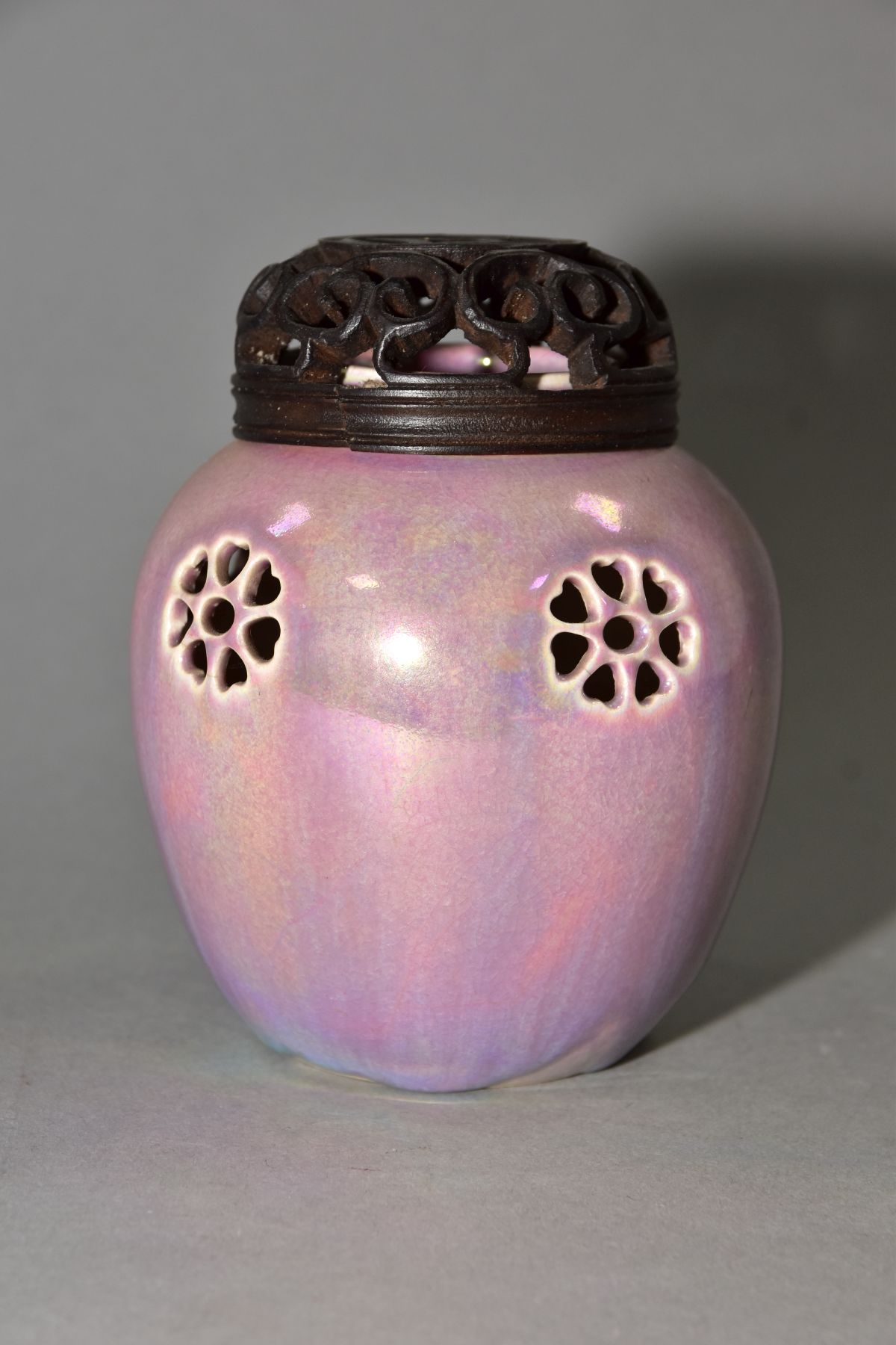 RUSKIN POTTERY, a pink lustre reticulated ginger/pot pourri jar, pierced flowers with heart shaped