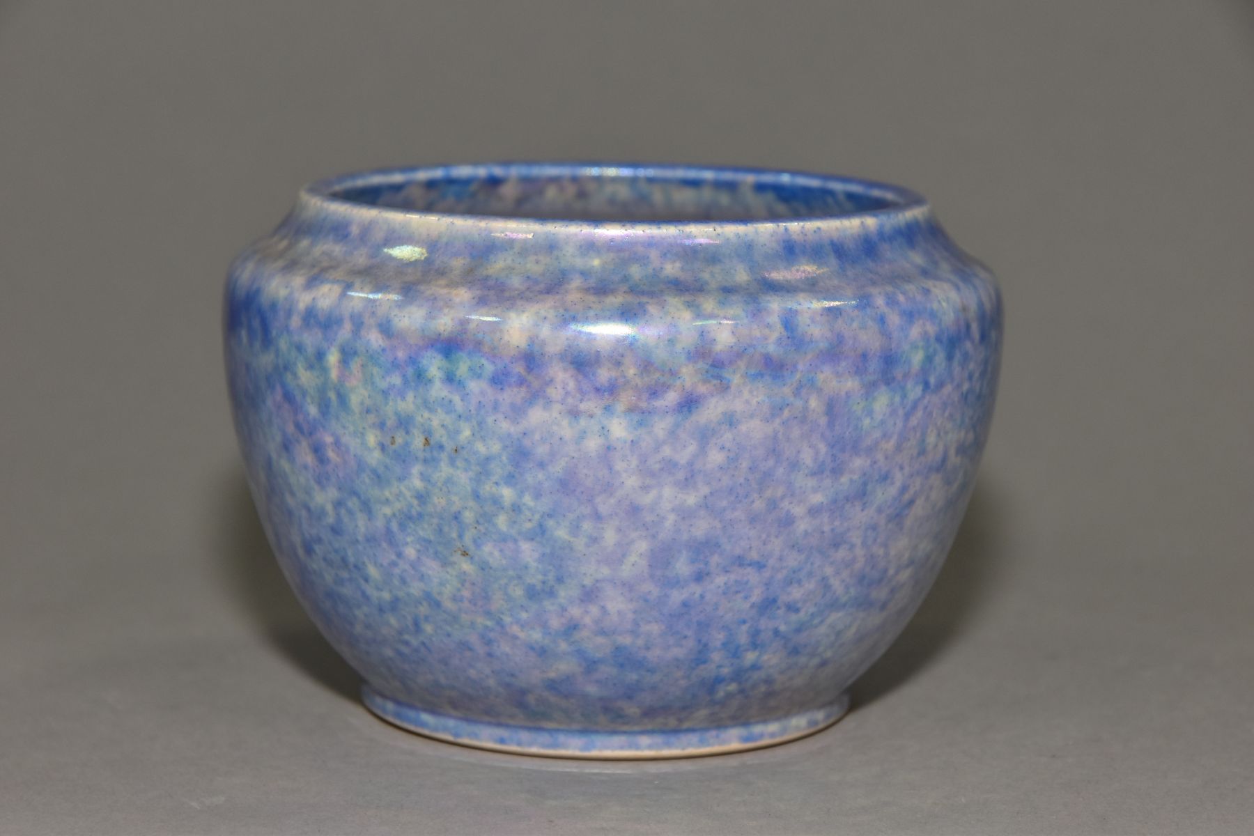 RUSKIN POTTERY, a blue lustre glazed jardiniere, impressed Ruskin England to the base, height