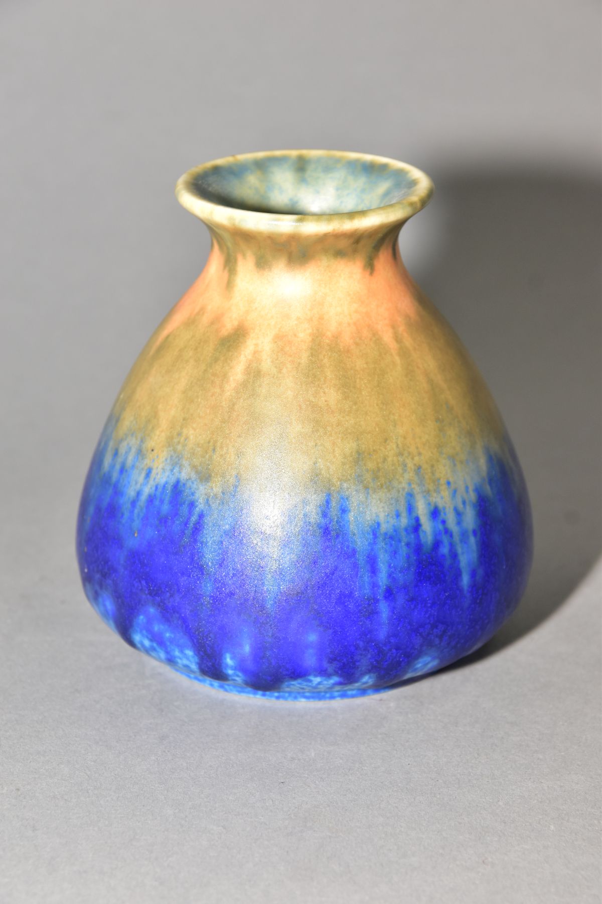 RUSKIN POTTERY, a conical vase with flared rim, bands of orange, green and blue glaze, approximate - Image 3 of 4