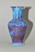 A COBRIDGE STONEWARE HIGH FIRED BALUSTER VASE, with flared rim and foot, mottled and speckled blue