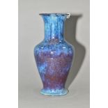 A COBRIDGE STONEWARE HIGH FIRED BALUSTER VASE, with flared rim and foot, mottled and speckled blue