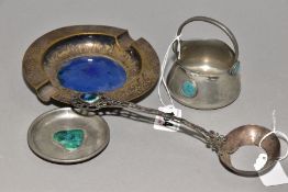 FOUR PIECES OF ARTS AND CRAFTS METALWARE WITH RUSKIN STYLE CERAMIC PLAQUES, comprising a white metal