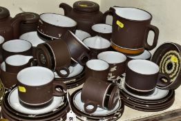A QUANTITY OF HORNSEA CONTRAST PATTERN TEA WARES, including two teapots, a large jug, cups,