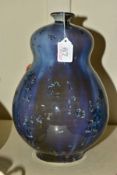 A DOUBLE GOURD SHAPED STUDIO POTTERY VASE, covered in a blue crystalline and streaked glaze,