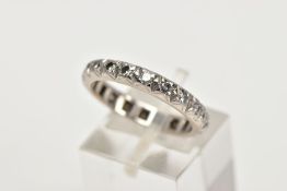 A DIAMOND ETERNITY RING, designed as a row of brilliant cut diamond, each within square shape claw