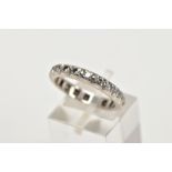 A DIAMOND ETERNITY RING, designed as a row of brilliant cut diamond, each within square shape claw