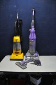 A DYSON DC07 UPRIGHT VACUUM CLEANER and a The Boss upright vacuum cleaner (both PAT pass and