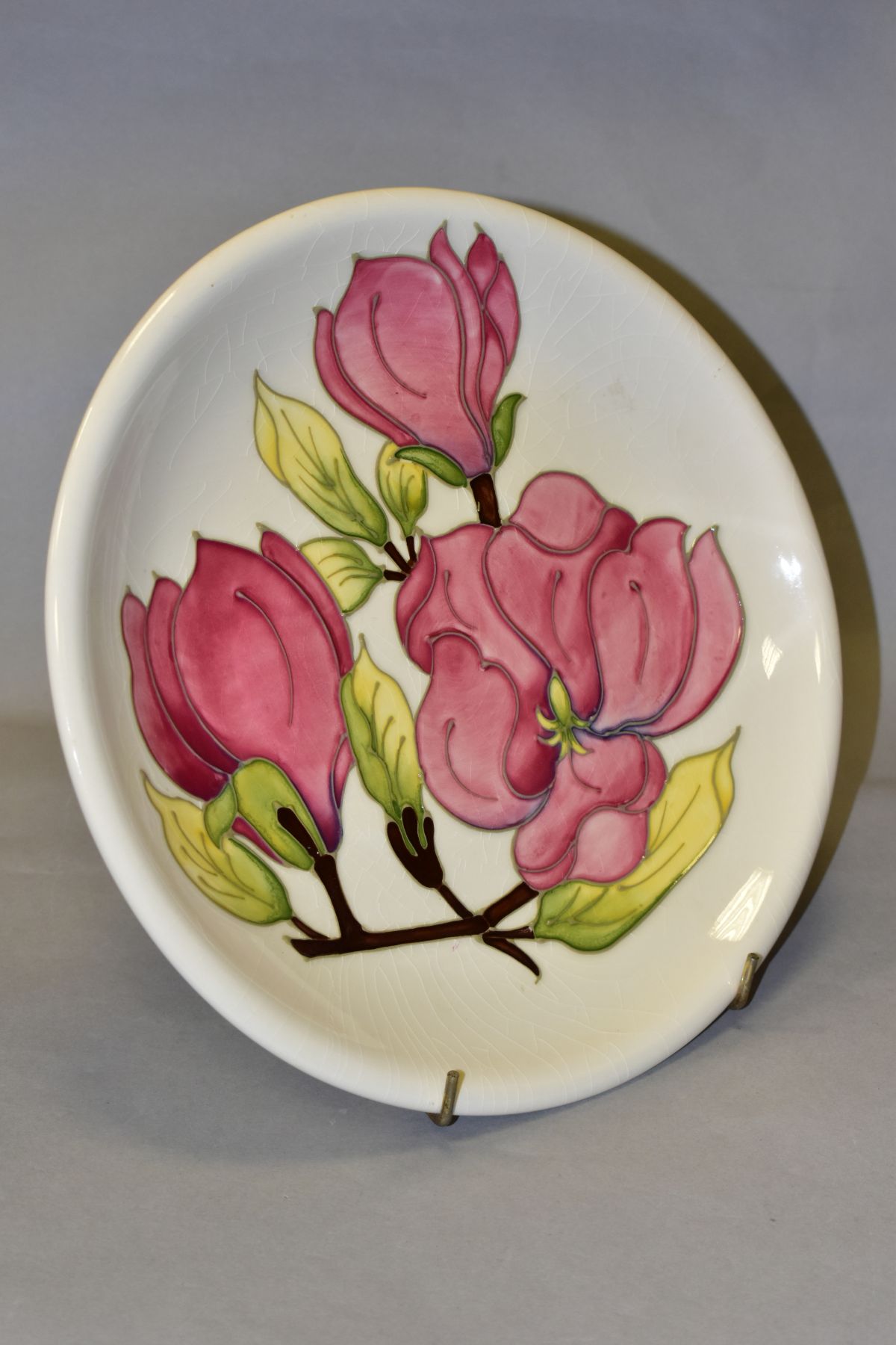 A MOORCROFT POTTERY CHARGER, with pink Magnolia design on cream ground, painted WM and impressed - Image 2 of 4