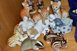 THREE HUMMEL FIGURES AND TEN NAO AND RUSSIAN ANIMAL FIGURES, the Hummel comprises two Apple Tree
