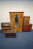 AN EDWARDIAN SATINWOOD SINGLE DOOR WARDROBE (cracks to base), a Victorian stained pine chest of