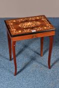 A SORRENTO FLORAL DECORATED MUSICAL SEWING TABLE (working) (key)