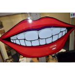 A MODERN DECORATIVE WALL HANGING OF A SMILING MOUTH AND TEETH, approximate size 80cm x 150cm