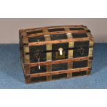 AN EARLY 20TH CENTURY WOODEN AND CLOTH DOME TOP TRAVELLING TRUNK, 77cm x depth 47cm x height 55cm (