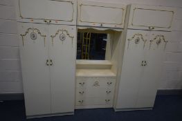 A CREAM FRENCH THREE PIECE BEDROOM FITMENT, overall width 229cm