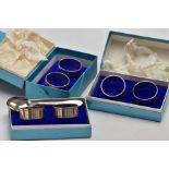 A SINGLE SILVER TEASPOON AND THREE CASED SETS OF NAPKIN RINGS, the teaspoon with a tapered reeded