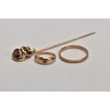 TWO 9CT GOLD RINGS AND A YELLOW METAL GARNET SET STICK PIN, the first a thin plain polished band,