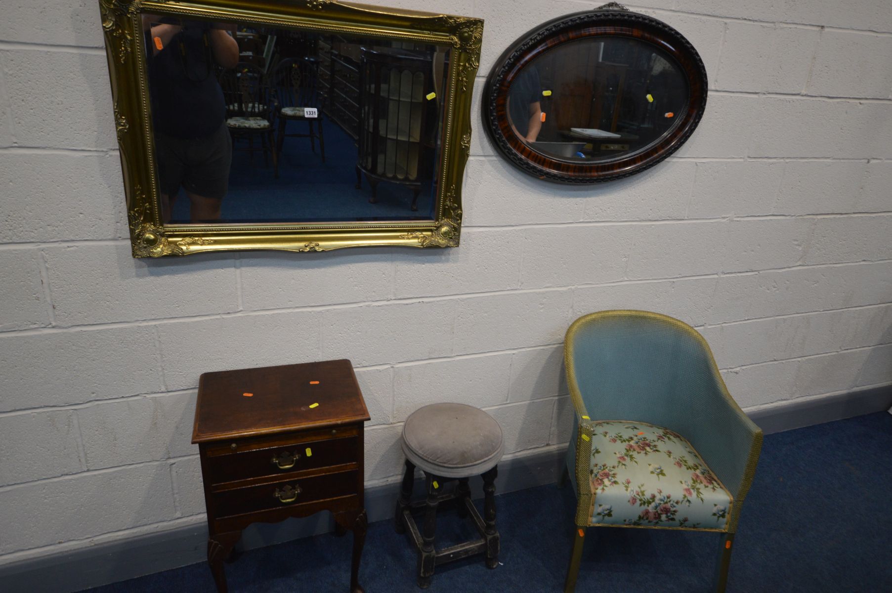 A GILTWOOD BEVELLED EDGE WALL MIRROR, and an oval wall mirror along with walnut bedside cabinet,