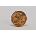 A GEORGE V FULL SOVEREIGN, the obverse depicting George V, the reserve depicting George and the